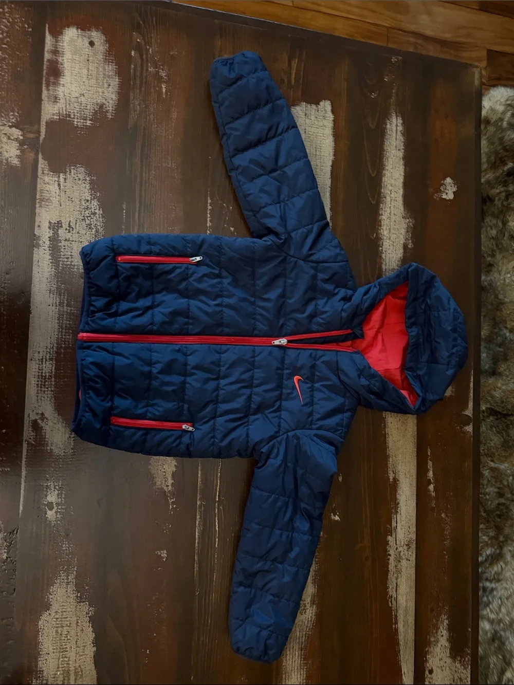 Nike Kids Navy Puffer Jacket with Red Trim and Hood Lining